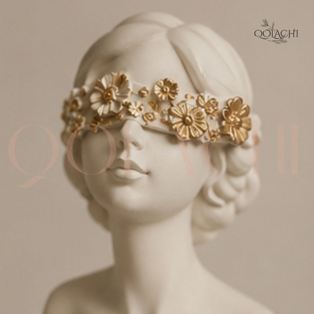 Close-up of gold floral crown detail on Goddess bust