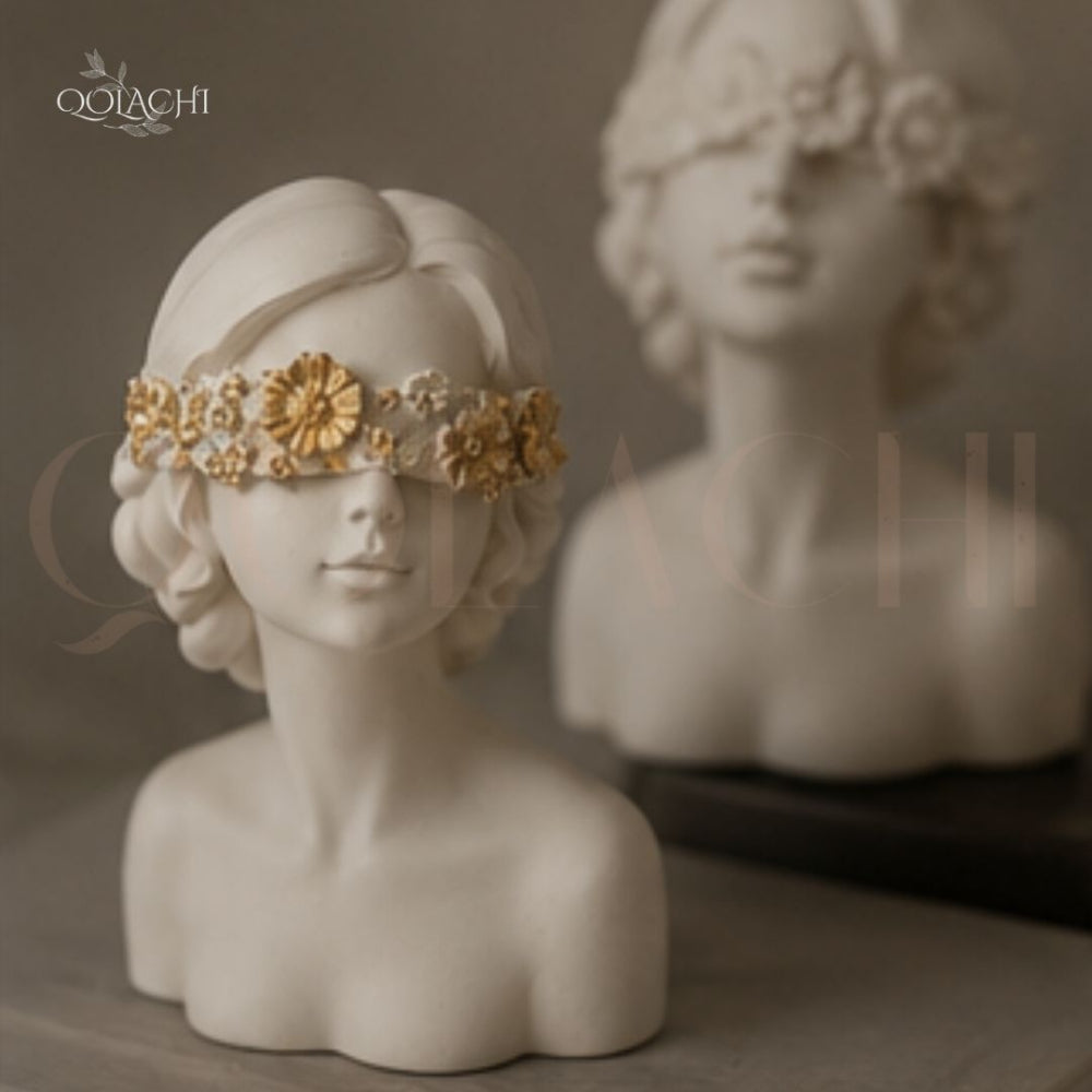 Two Goddess of Silence busts — front and back view