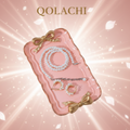 Qolachi pink bow jewelry tray on rose gold gradient background with floating petals