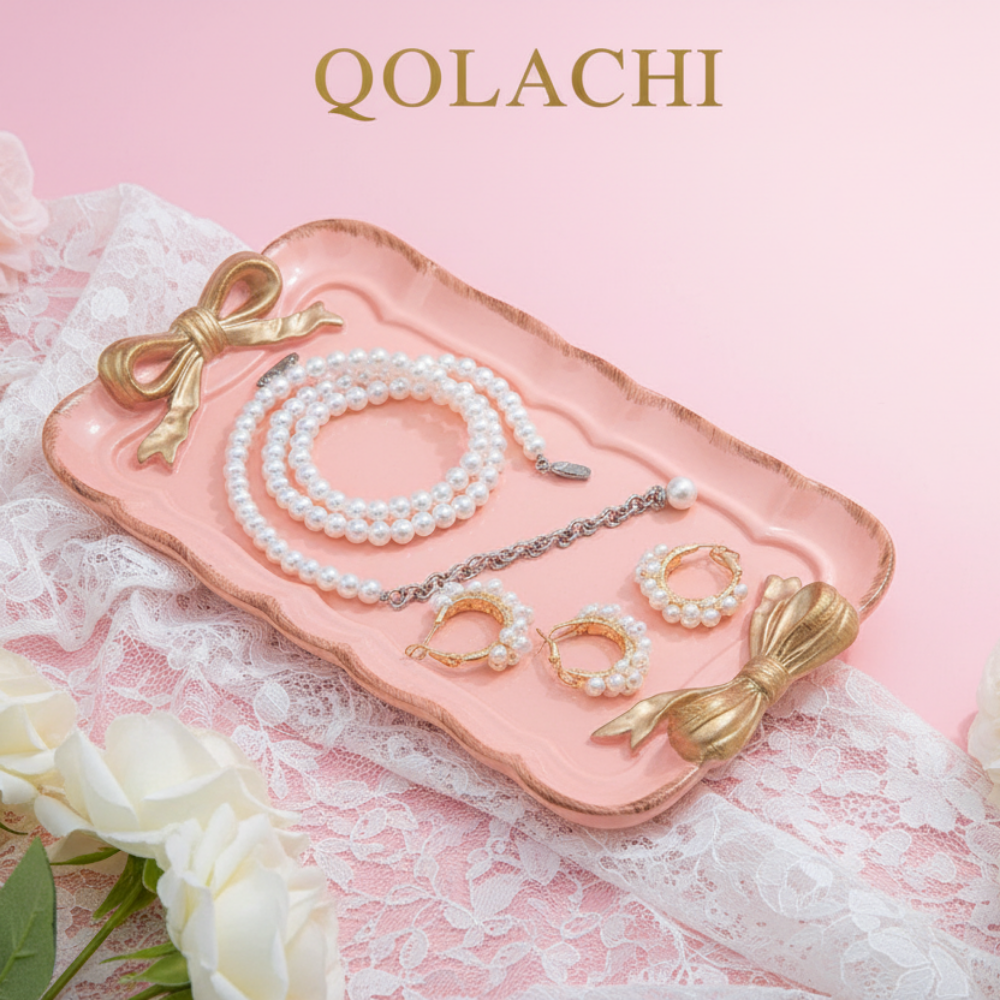 Qolachi pink ceramic bow jewelry tray with pearl jewelry display
